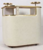A fabulous 1960's retro vinyl upholstered cocktail / drinks bar having raised serving platforms