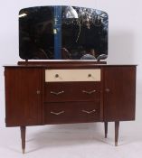A vintage 1960's two tone dressing table chest of drawers.
