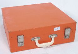 A fantastic vintage retro Sirram picnic hamper in orange, appearing to be complete,