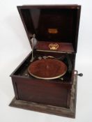 A vintage Columbia cased tabletop portable gramophone, with makers label to inside lid.