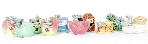 A collection of retro 20th century 10 ceramic ' Mouse in a ' figurines.