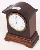 A Charles Frodsham of London mahogany bracket clock having ceramic white dial with roman numeral