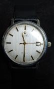 An Omega Seamaster De Ville 1960's wristwatch having textured cream dial with gilt baton numerals,