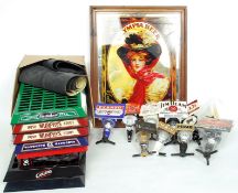 A collection of breweriana collectors advertising to include optics, Drip trays,