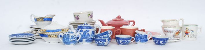 A vintage Staffordshire childs part tea service along with others to include blue and white,