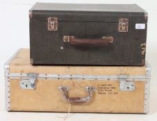 A good vintage 1950's white and metal bound suitcase together with a sewing machine box