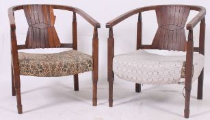 A pair of  1940's bentwood  fireside armchairs having panel backs to each.