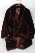 A ladies vintage  full length simulated faux fur coat,