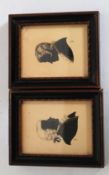 A pair of Victorian framed silhouette portraits of gentlemen set within original frames