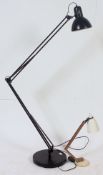A large contemporary floor standing adjustable anglepoise lamp light,