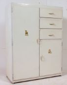 A retro 1970's painted tallboy linen cupboard chest comprising cupboard with short drawers to the
