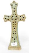 A ceramic Celtic inspired cross finished in a fat lava style glaze.
