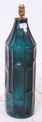 A stunning vintage 1970's Swedish retro blue glass table lamp in the for of a large bottle.