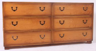 A double bank of drawers, six drawers in total having recessed campaign handles.