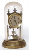 A 20th century glass domed anniversary clock with brass movement,
