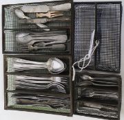 A collection of miniature dolls house cutlery in wirework cutlery trugs ( 4 in total )