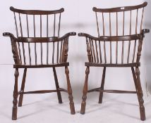 An excellent pair of 20th century antique style Windsor armchairs.