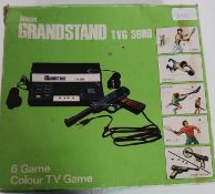 A retro 1970's Boxed Grandstand TVG 3600 video / computer games console complete with hand gun