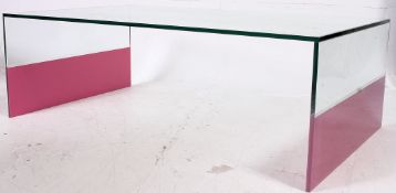 A contemporary glass coffee / low table H40 x W120 x D70cm