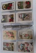 A good large collection of vintage greetings postcards.