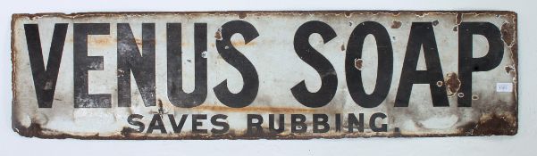 A vintage advertising enamel sign ' Venus Soap - Safer Rubbing ' of rectangular form.