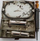 A vintage cased 1950's S Maw Son & Sons medical equine syringe set complete in case together with