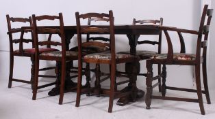 A Jaycee oak refectory dining table and 6 chairs. The think oak top over lyre shaped supports.