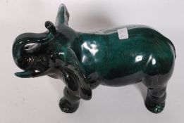 A very large ceramic Elephant of Canadian origin by Blue Mountain Pottery 38cm long