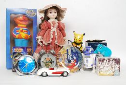 A collection of Disney items, Sesame Street Ernie lamp,