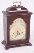 A contemporary Tempus fugit bracket clock by Stewart having good inset brass movement to the