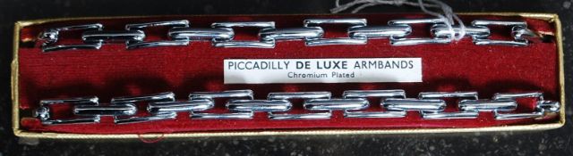 A pair of retro 1970's bankers armbands - bands by Picadilly De Luxe Armbands.