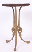 A Victorian cast iron coalbrookdale style gilt painted tavern table.