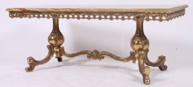 A 1950's green marble and gilt metal rococo vintage coffee table.