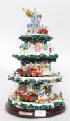Walt Disney musical lighted animated table top Christmas tree having fifty Disney characters from