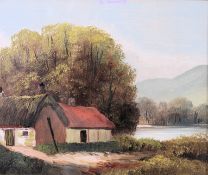 A mid century oil on board painting in frame of a lakeside cottage scene with woodland to rear,