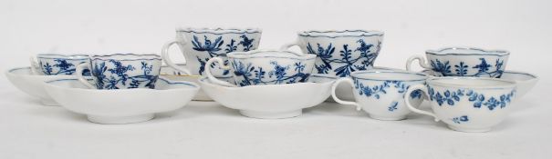 A collection of Meissen blue and white china - part tea service comprising teacups and saucers etc