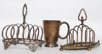2 Victorian decorative silver plated toast racks together with a half pint tavern mug engraved for