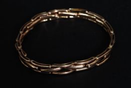 An Edwardian / 1920's ladies 9ct gold expandable bracelet of link form. Weight 10.