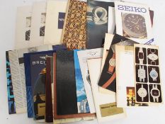A collection of vintage brochures - instruction manuals for watches / wristwatches.