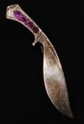 A Burmese 14ct gold and pink sapphire ? set Kukrie knife dagger brooch sent back from Burma after