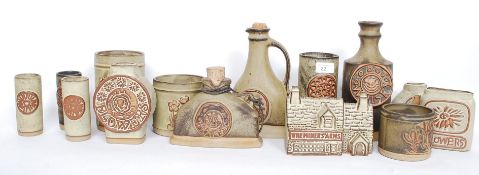 TREMAR; A collection of 12x pieces of Tremar pottery - mostly vases but also with three decanters.