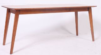 A retro 1970's good quality Vanson coffee table in oak raised on angular legs with shaped