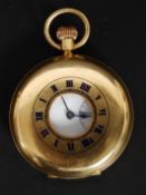 An 18ct gold Rotherhams half hunter pocket watch.