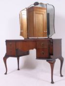 A 1930's dressing table having a three piece mirror,