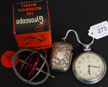 A silver plated brass vesta being rococo scroll decorated together with a Smiths Empire pocket