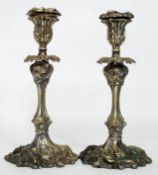 A pair of 20th century Art Nouveau style brass and plate candlesticks,