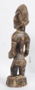 A 20th century African / Polynesian carved fertility figure H46cm