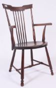 A Victorian Goldsmiths Windsor chair.