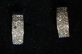 A pair of 18ct whte gold and diamond earrings approx 3.