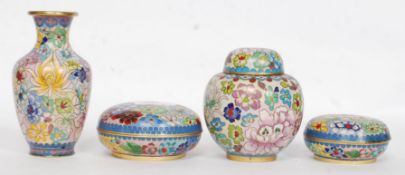A collection of decorative 20th century enamel cloisonne wares to include pots, lidded bowls etc,